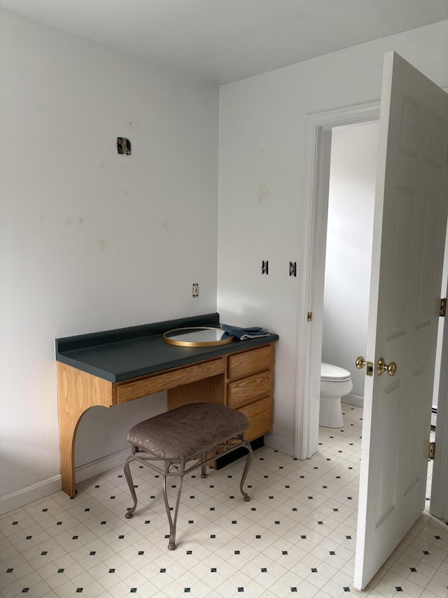186 Line Rd, Buxton, ME 04093 - home office with baseboards, light floors, and a sink