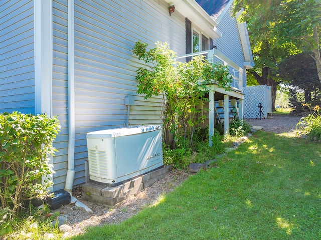 view of property exterior with a yard