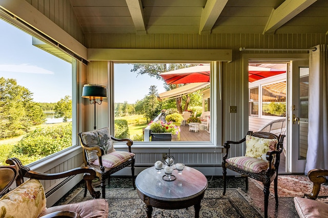 sunroom / solarium with wooden ceiling and vaulted ceiling with beams