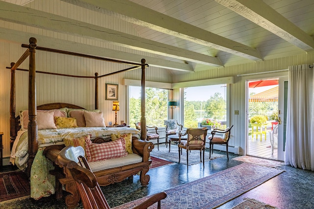 bedroom with access to outside, a baseboard radiator, and beam ceiling