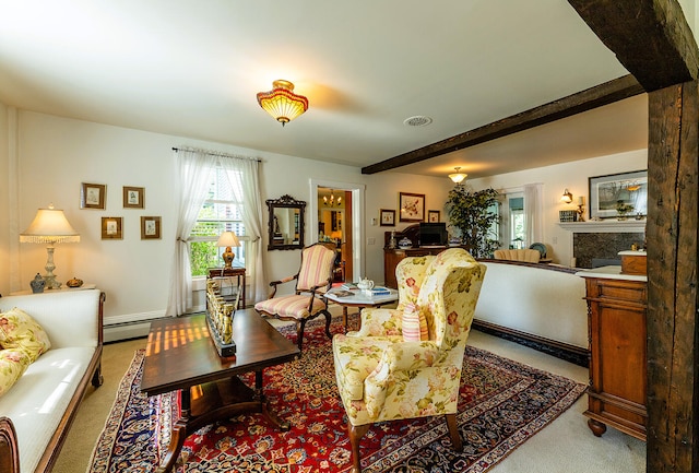 living room featuring a baseboard heating unit and light carpet