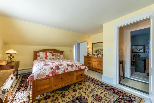 bedroom featuring a baseboard heating unit, vaulted ceiling, and light colored carpet