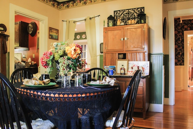 dining area with dark wood-type flooring