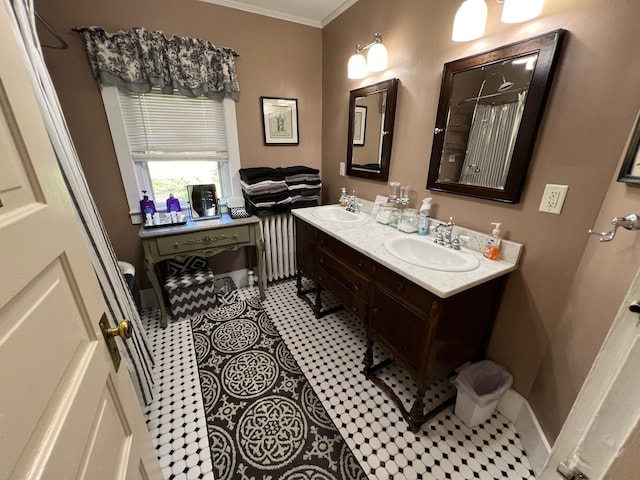 bathroom featuring vanity, radiator, tile patterned flooring, and ornamental molding