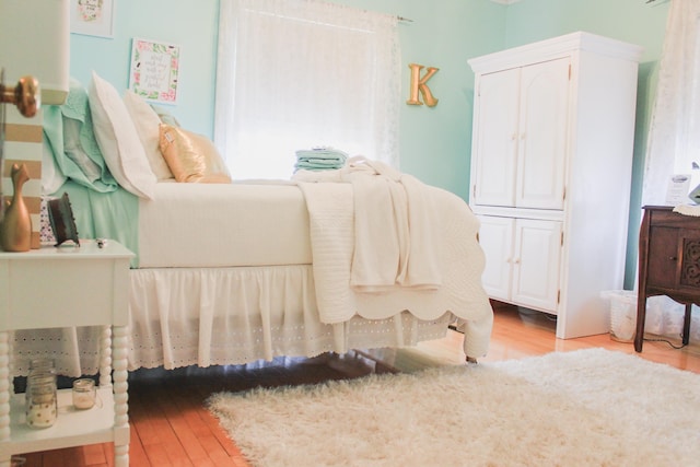 bedroom with light hardwood / wood-style flooring