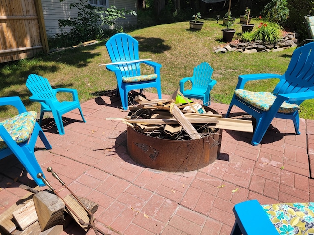 view of patio / terrace with an outdoor fire pit