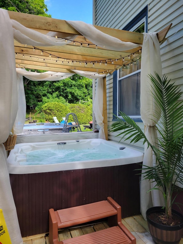 view of patio with a hot tub