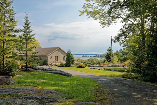 view of yard with a water view