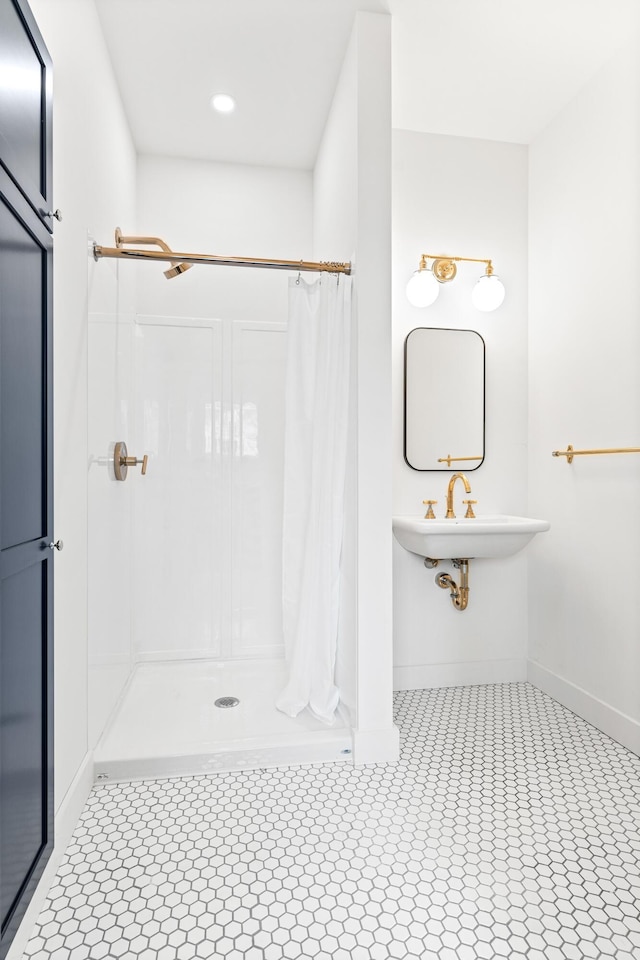 bathroom with a shower with shower curtain