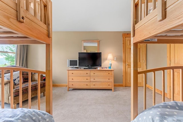 bedroom with light carpet