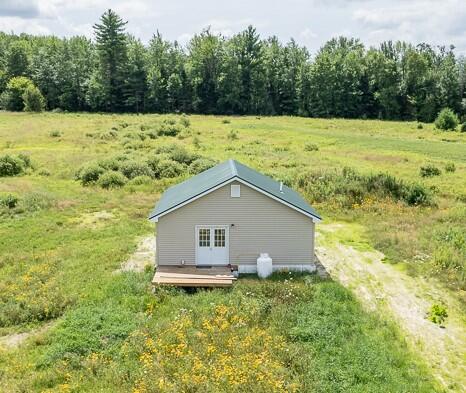 exterior space featuring a deck and a rural view