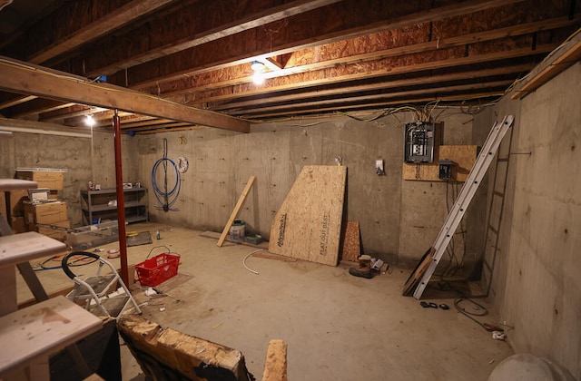 basement featuring electric panel