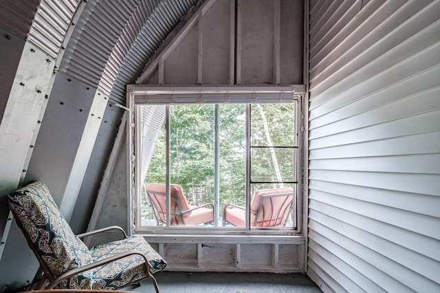 sunroom / solarium featuring a healthy amount of sunlight