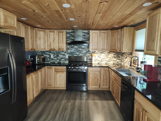19 Resh Rd, Searsport, ME 04974 - kitchen featuring refrigerator with ice dispenser, gas stove, wall chimney range hood, black dishwasher, and light brown cabinets