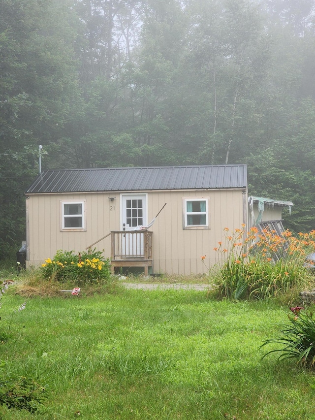 19 Resh Rd, Searsport, ME 04974 - manufactured / mobile home with a metal roof and board and batten siding