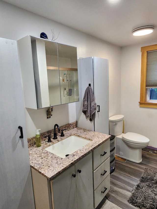 19 Resh Rd, Searsport, ME 04974 - bathroom featuring wood finished floors and vanity
