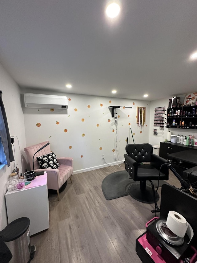 19 Resh Rd, Searsport, ME 04974 - living area with a wall mounted air conditioner, wood finished floors, a dry bar, and recessed lighting
