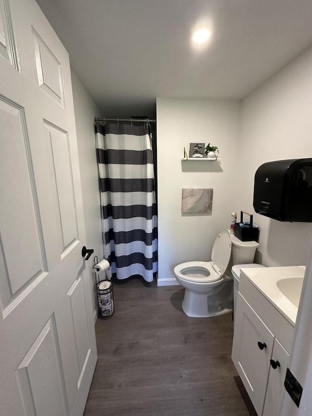 19 Resh Rd, Searsport, ME 04974 - bathroom with vanity, wood finished floors, and a shower with curtain
