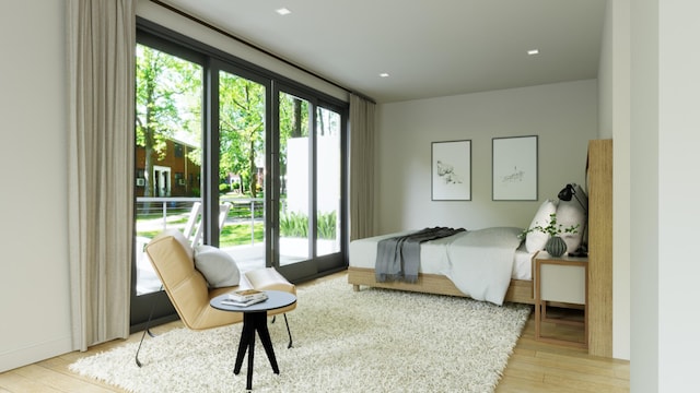 bedroom featuring access to outside and light hardwood / wood-style flooring