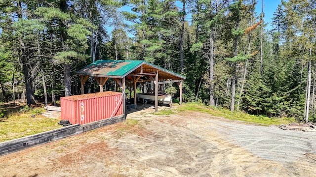 exterior space with a shed