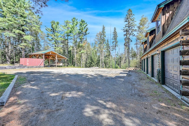 view of yard featuring a garage