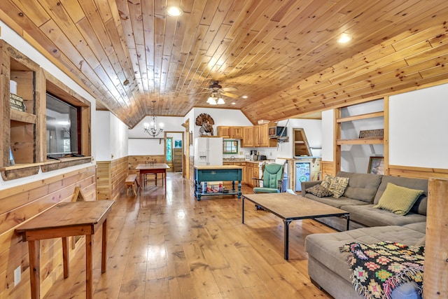 living room with vaulted ceiling, ceiling fan with notable chandelier, wooden ceiling, sink, and light wood-type flooring