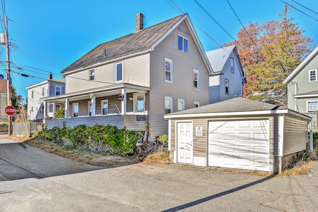 front of property with a garage and a porch