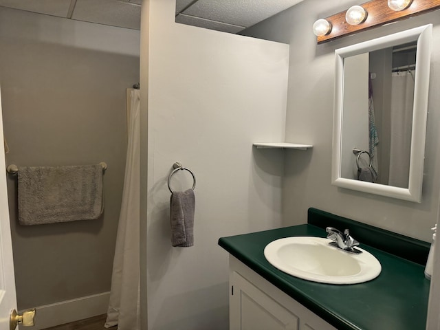 bathroom featuring vanity and baseboards
