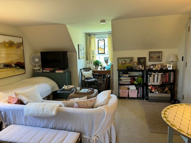 living room with lofted ceiling and carpet