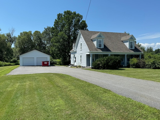 view of property exterior with a garage, a yard, and an outdoor structure