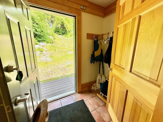 54 Harbor Hills Ln, Addison, ME 04606 - doorway to outside with light tile patterned flooring