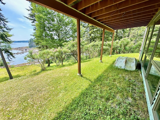 54 Harbor Hills Ln, Addison, ME 04606 - view of green lawn with a water view