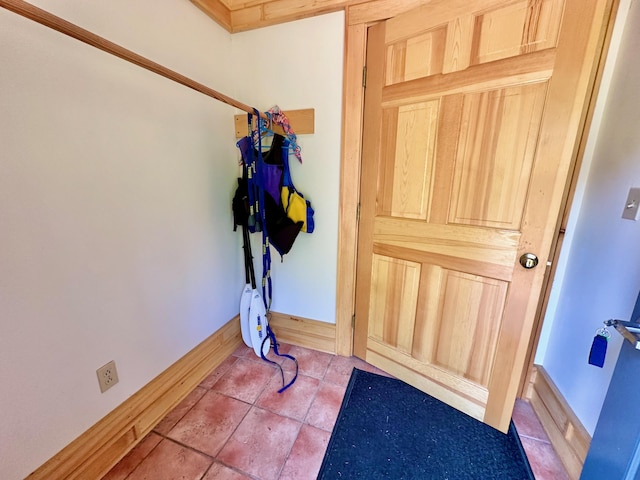 54 Harbor Hills Ln, Addison, ME 04606 - foyer entrance featuring light tile patterned floors and baseboards