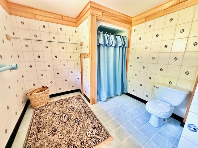 54 Harbor Hills Ln, Addison, ME 04606 - bathroom with toilet, tile walls, tile patterned flooring, and curtained shower