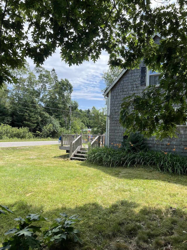 view of yard with a deck