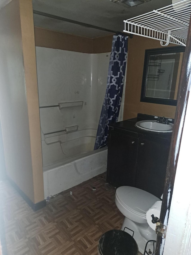 full bathroom featuring shower / bath combination with curtain, toilet, parquet flooring, and vanity