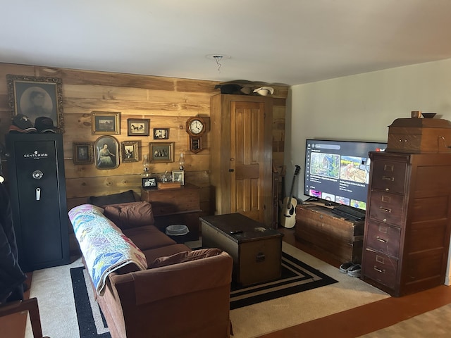 30 Steamboat Rd, Swans Island, ME 04685 - living area featuring light colored carpet and wood walls