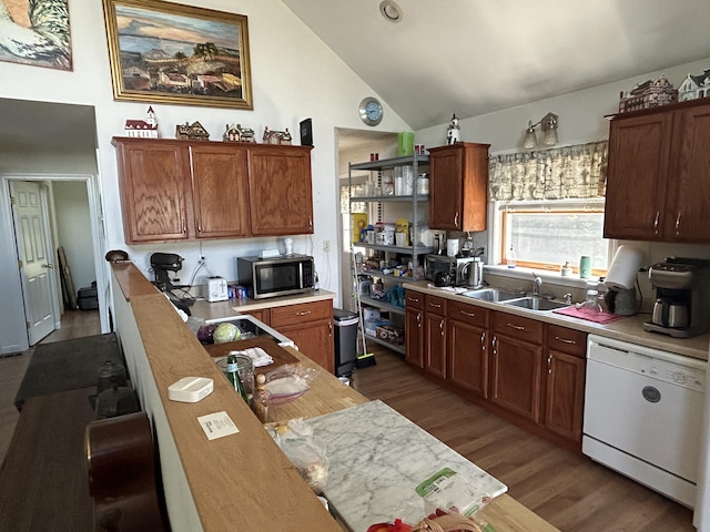 30 Steamboat Rd, Swans Island, ME 04685 - kitchen with light countertops, stainless steel microwave, dark wood finished floors, a sink, and dishwasher