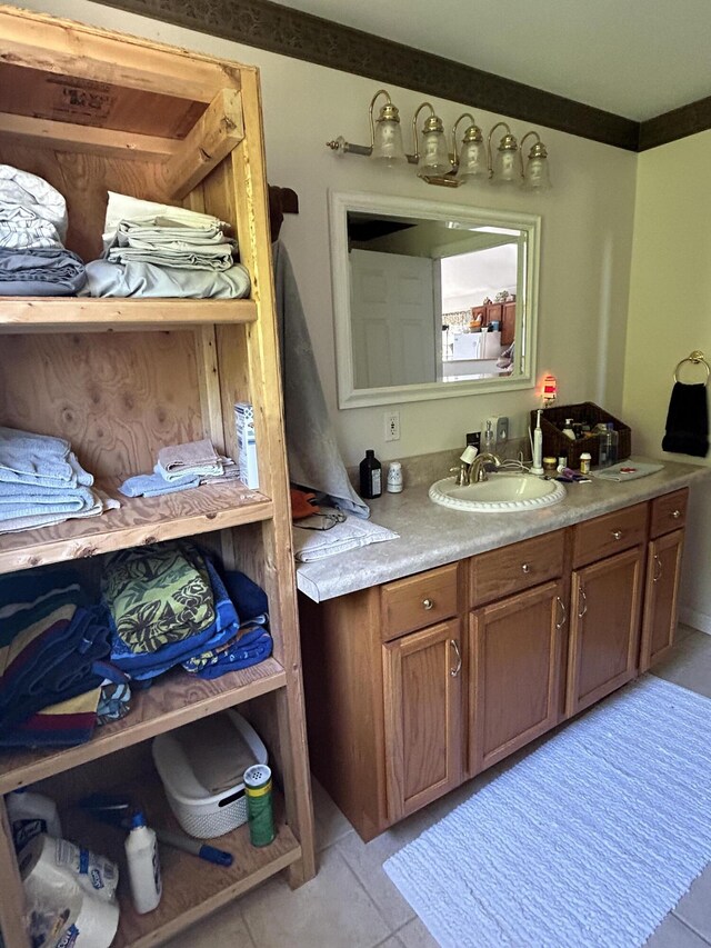 30 Steamboat Rd, Swans Island, ME 04685 - bathroom featuring ornamental molding, tile patterned flooring, and vanity