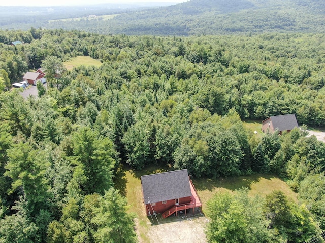 drone / aerial view with a view of trees