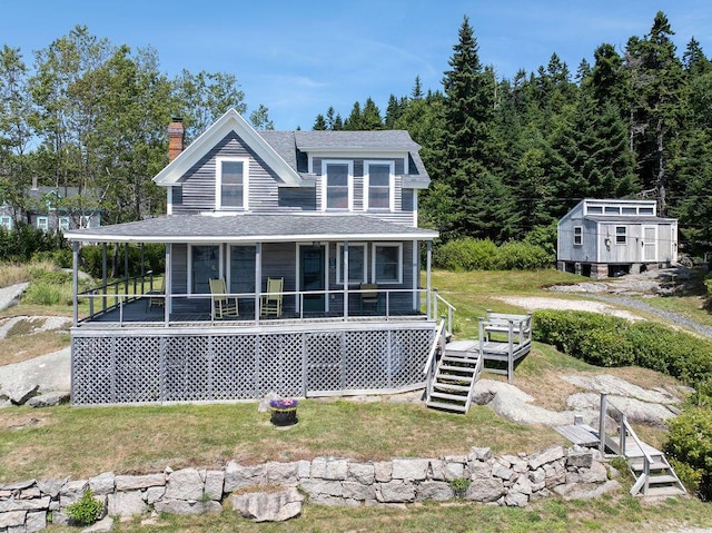 view of front facade with a sunroom