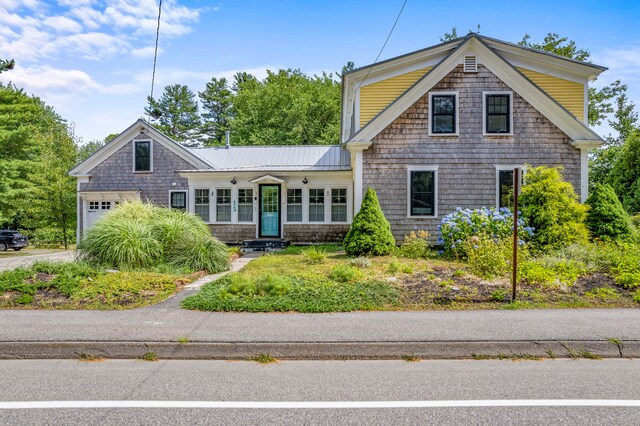 view of front of property featuring covered porch