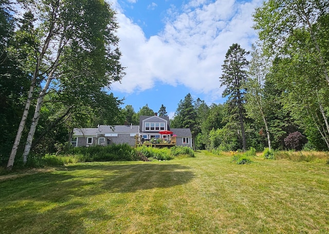 view of yard featuring a deck