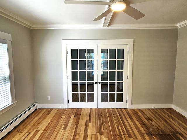 empty room featuring ceiling fan, crown molding, french doors, wood finished floors, and a baseboard radiator