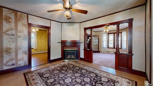 unfurnished living room with a baseboard heating unit, carpet, and a textured ceiling