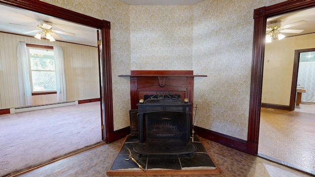 living room featuring ceiling fan and baseboard heating