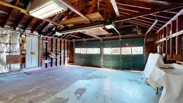 interior space with concrete floors and lofted ceiling