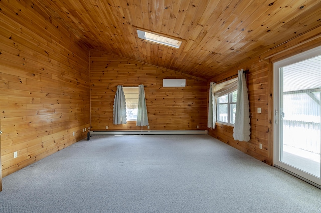 carpeted empty room with wooden ceiling, lofted ceiling with skylight, baseboard heating, and wood walls