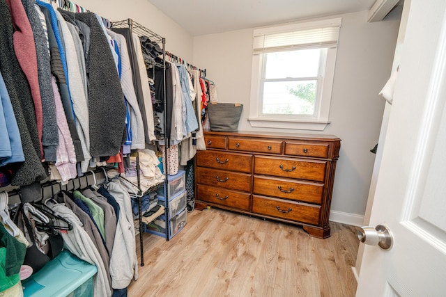 walk in closet featuring light hardwood / wood-style floors