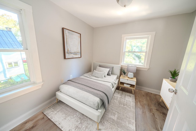 bedroom featuring light hardwood / wood-style flooring